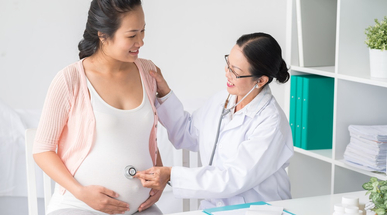 pregnantwomanwithdoctor.jpg