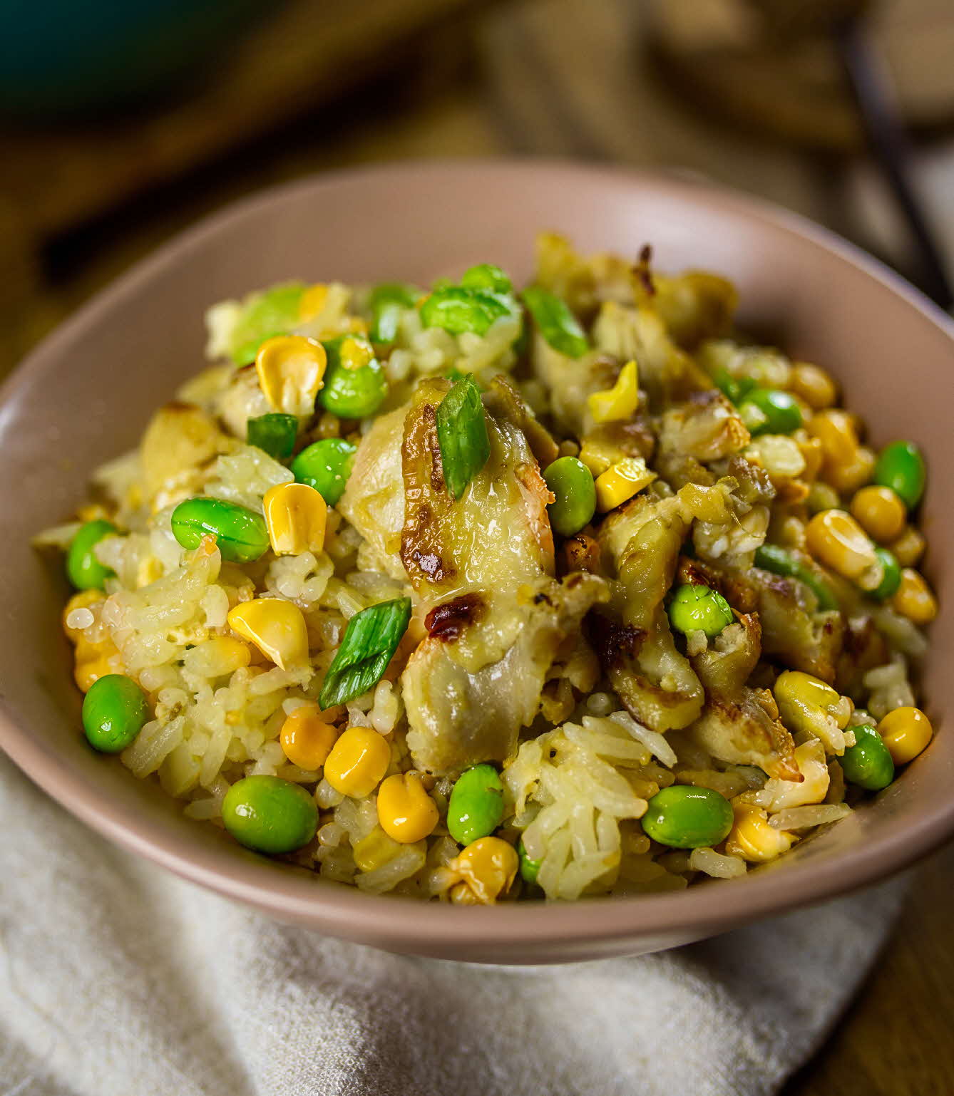 One pot chicken oyakodon with rice, egg, corn and edamame.