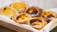 Tray of freshly baked portugese egg tarts