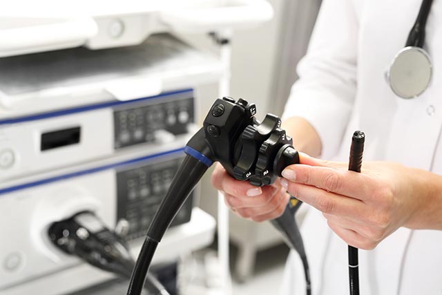 Gastroenterologist preparing to meet her patient