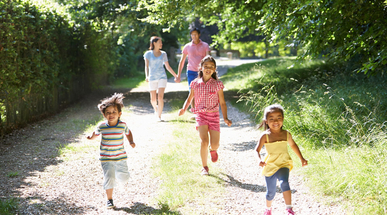 asian-family-enjoying-walk-in-countryside.jpg