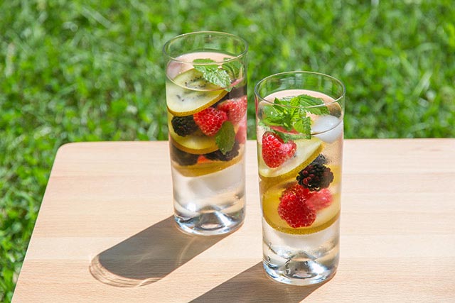 Choose water or fruit-infused water over sugary beverages.