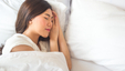 Young woman overcomes insomnia and sleeps better now.