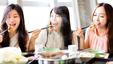 3 girls enjoying their healthy meals together
