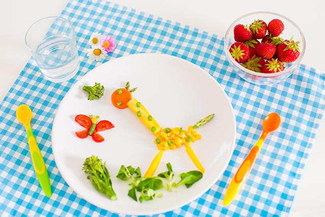 When making art with food, try using fruit and vegetables of different shapes and sizes.