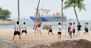 Live a healthy life and spend time with your friends playing beach volleyball.