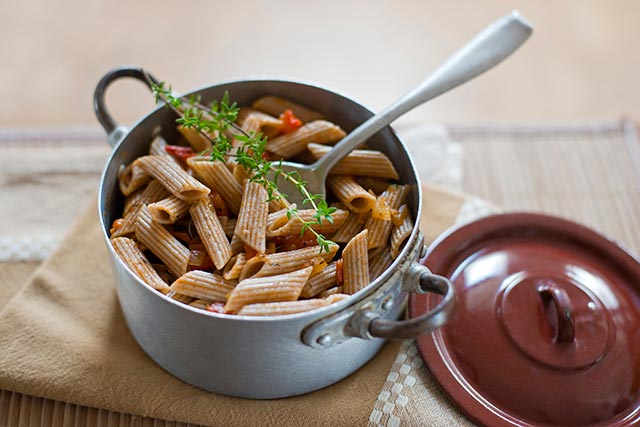 Healthy wholegrain pasta in a steel pot