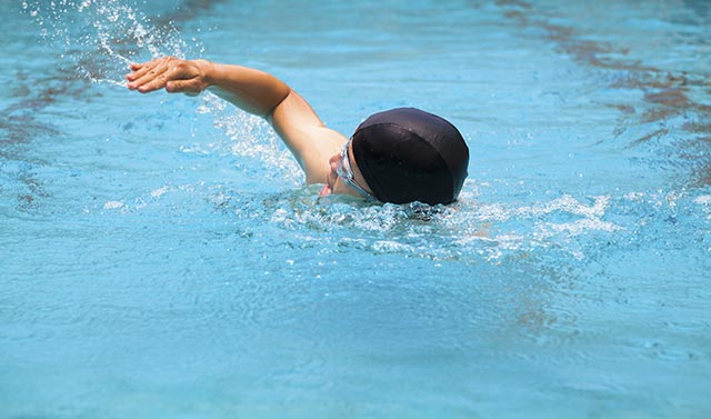 Man Swimming In The Pool