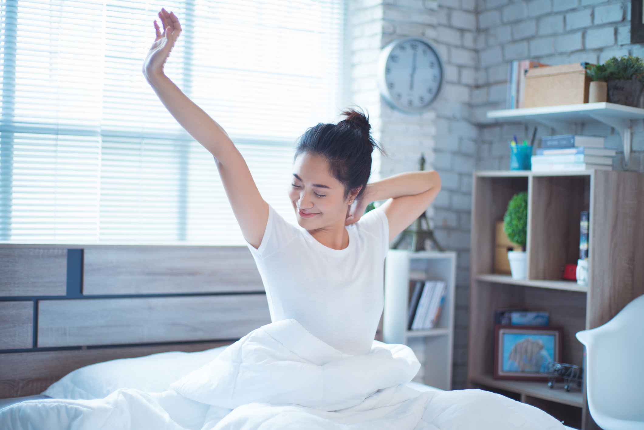 To cope with stress, a young woman takes time to relax and take a break.