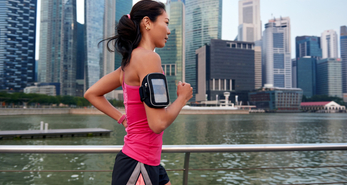 Jogging around Singapore to keep fit.