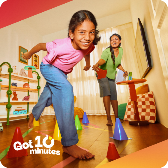 Parent and child enjoying an activity together without using a screen.