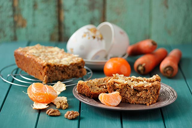 Home made dense carrot cake with mandarin oranges