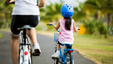mother-and-daughter-are-cycling-in-the-park