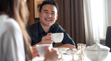 asian-male-at-a-cafe.jpg