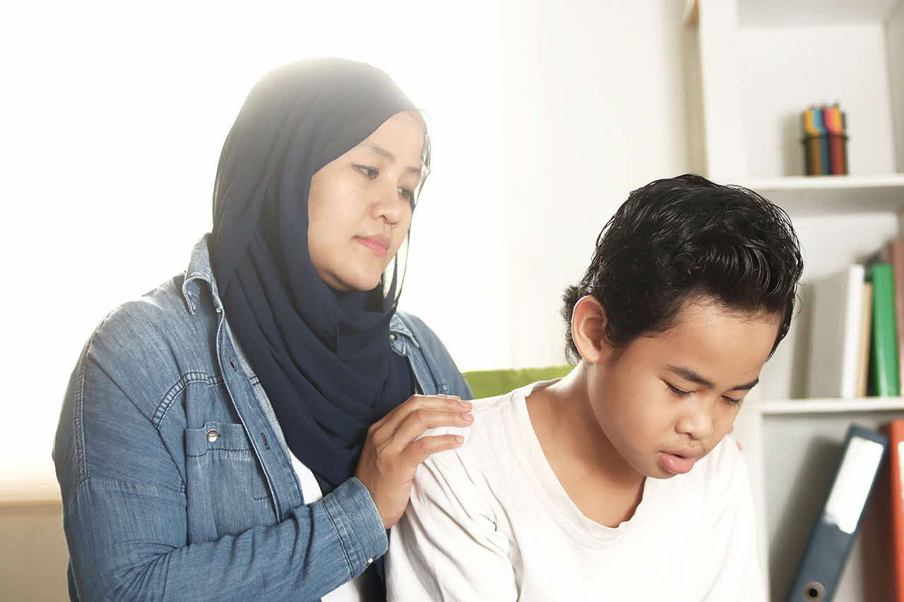 Parent having a moment with their child