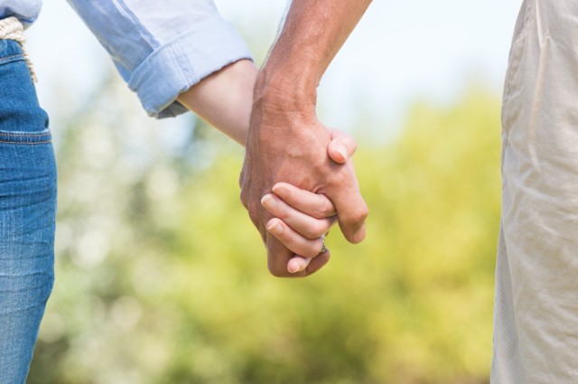 couple holding hands