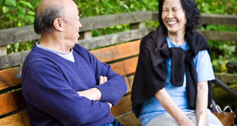 Senior couple enjoying each other's company and spending time in a park