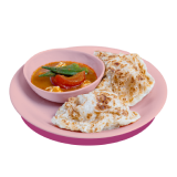 Plate of roti prata served with curry containing vegetables.
