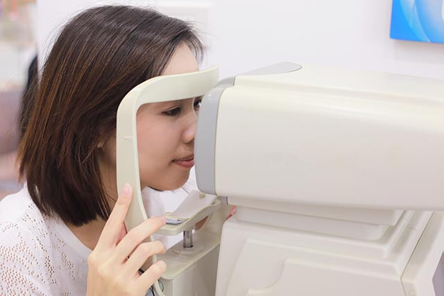 A young girl getting her eye checked