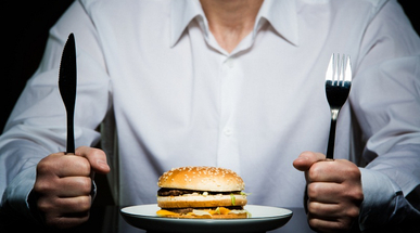 lifestyle_man_eating_burger.jpg