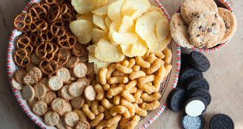 Bowl of unhealthy snacks