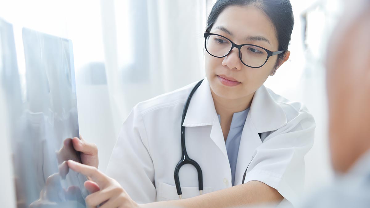 young-female-doctor-examining-x-ray-film.jpg