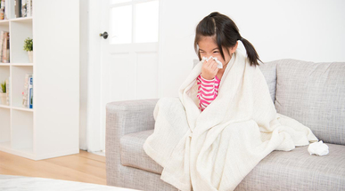 little-girl-sick-blowing-nose.jpg