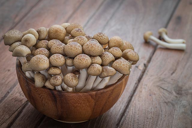 Brown Shimeji Mushrooms in a Wooden Bowl