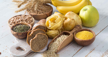 Differnt types of food with different glycaemic index placed on a wooden table