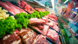 Different cuts of meat in the chiller at a butcher